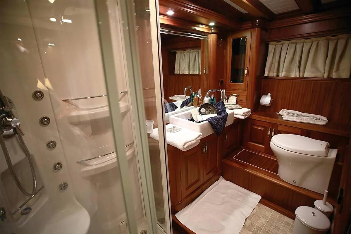 a bathroom with a glass shower aboard NURTEN A Yacht for Sale