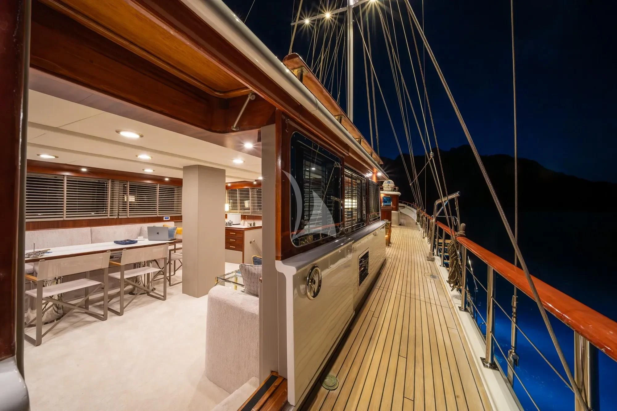 a long wooden walkway with a railing aboard NURTEN A Yacht for Sale