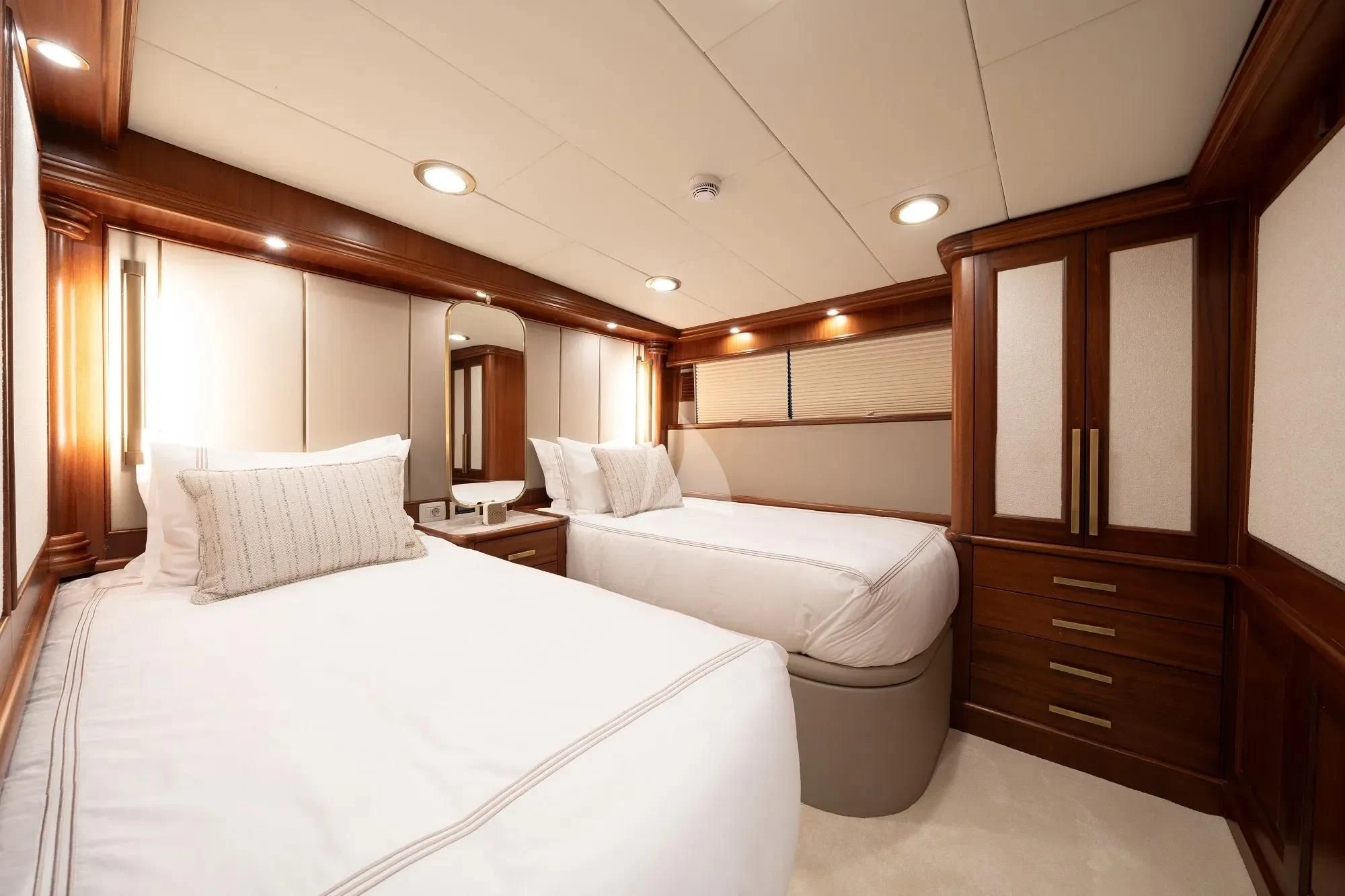 a room with a bed and a mirror aboard NURTEN A Yacht for Sale