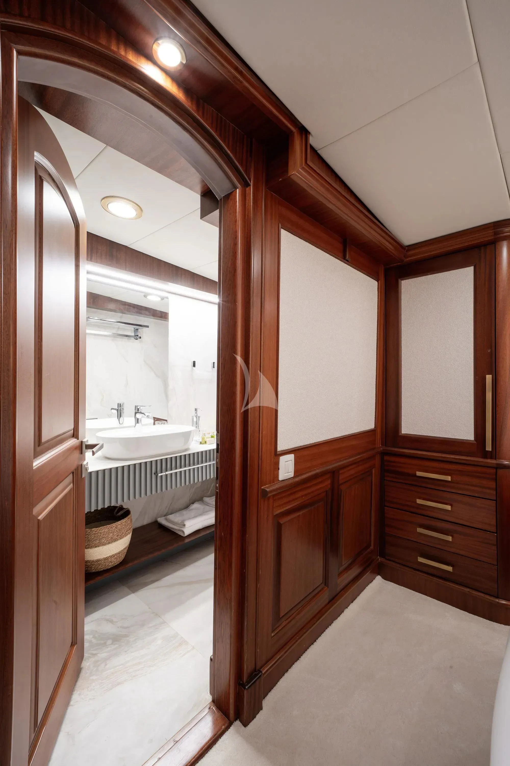 a bathroom with a sink and a mirror aboard NURTEN A Yacht for Sale
