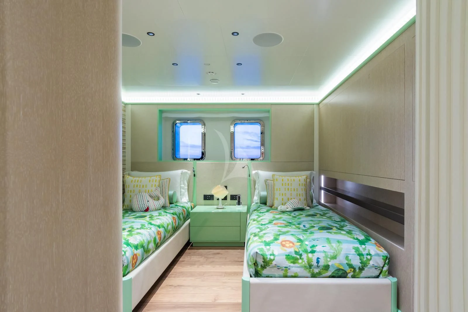 a room with two beds aboard RIO Yacht for Sale