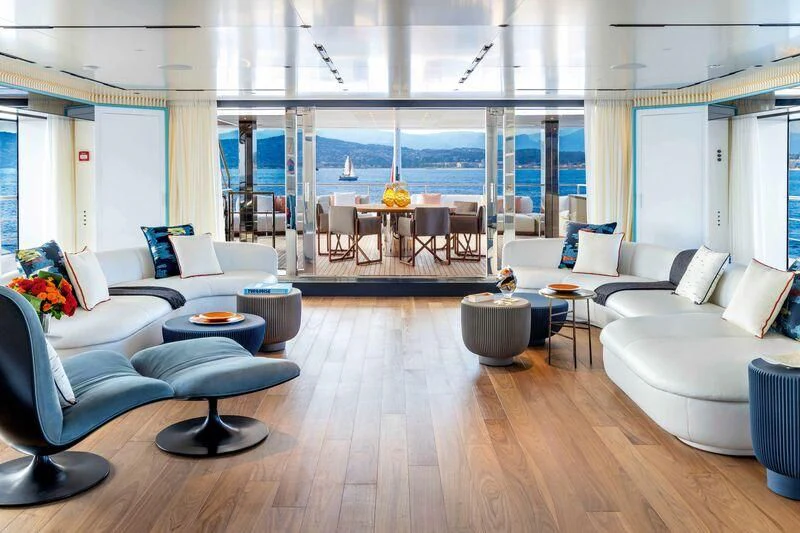 a living room with a large window aboard RIO Yacht for Sale