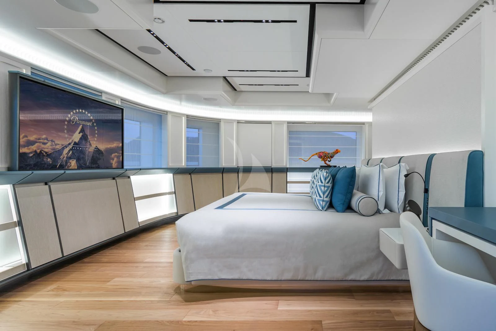 a room with a bed and a television aboard RIO Yacht for Sale