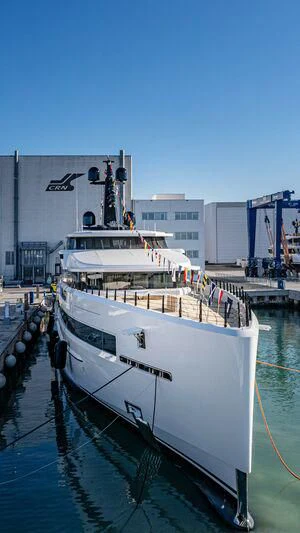 a large white boat in a harbor aboard RIO Yacht for Sale
