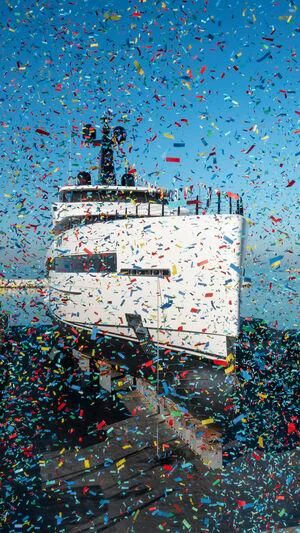 a large ship in a sea of colorful water aboard RIO Yacht for Sale