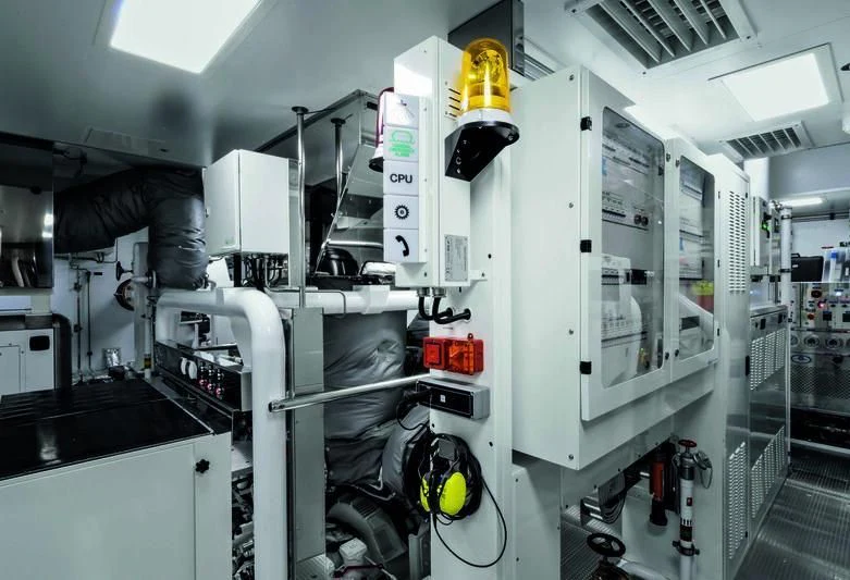 a machine in a room aboard RIO Yacht for Sale