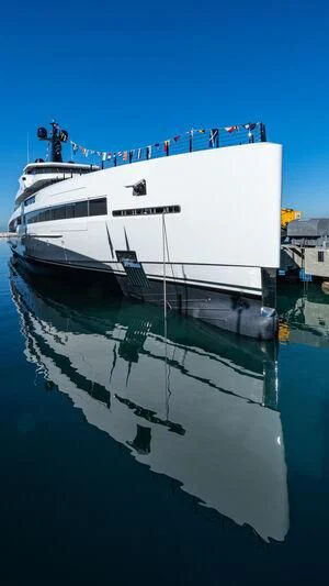 a large white boat in a body of water aboard RIO Yacht for Sale