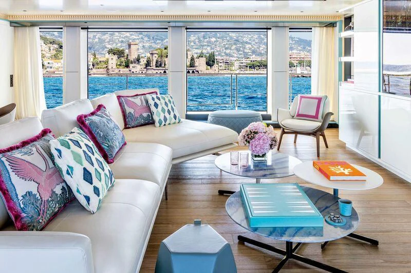 a living room with a large window aboard RIO Yacht for Sale