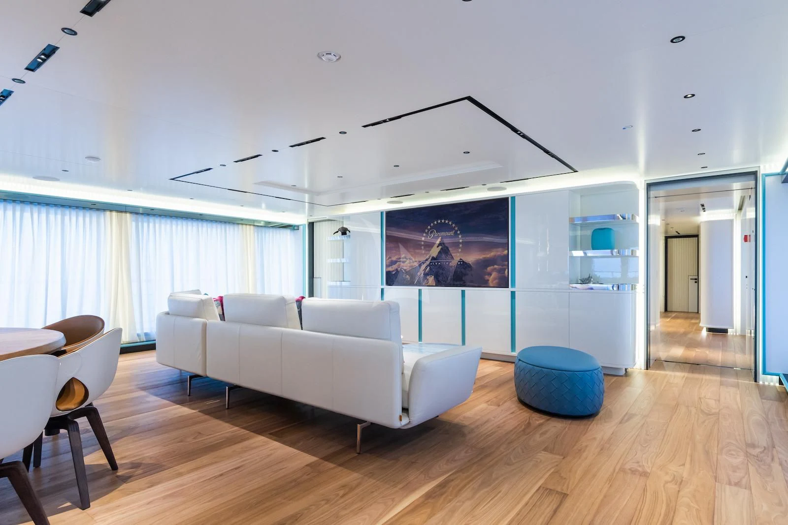 a living room with a large window aboard RIO Yacht for Sale