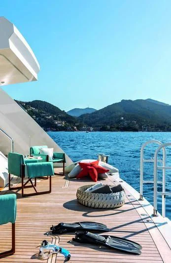 a boat on a deck aboard RIO Yacht for Sale