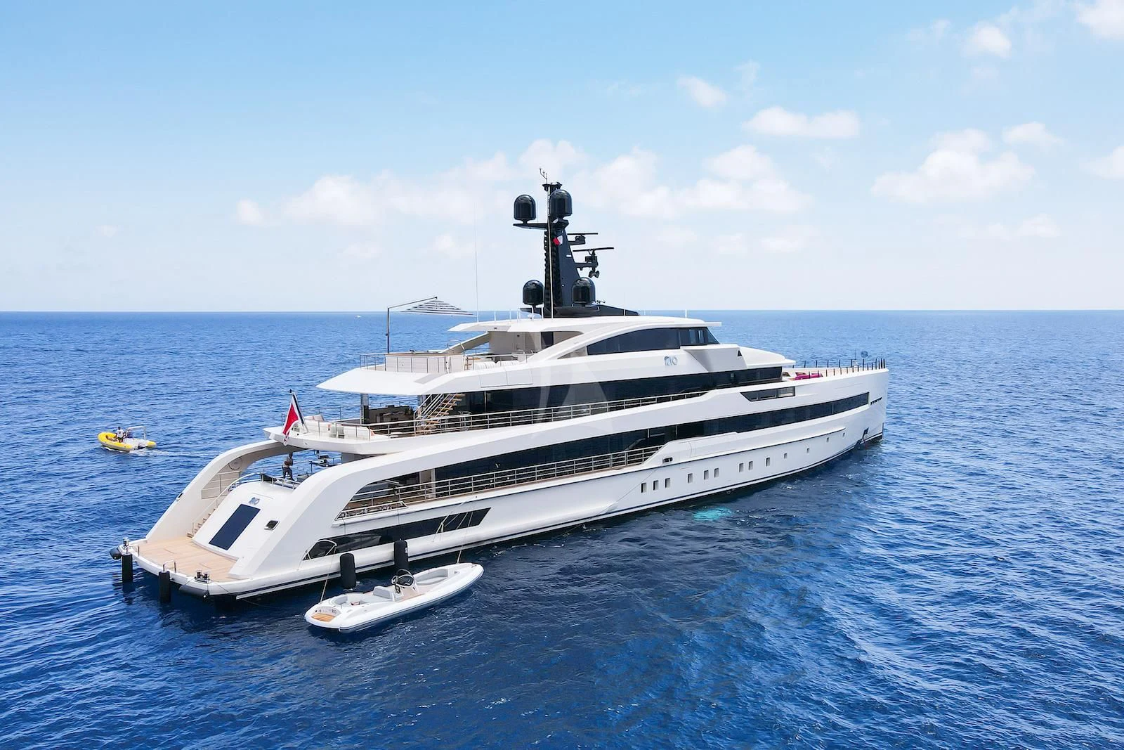 a large white yacht in the water aboard RIO Yacht for Sale