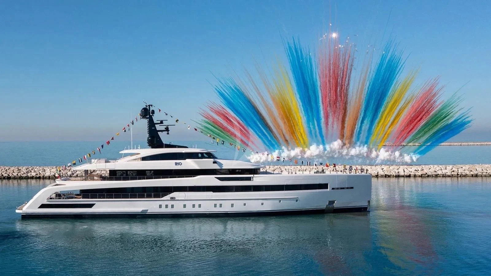 a boat with a rainbow in the background aboard RIO Yacht for Sale
