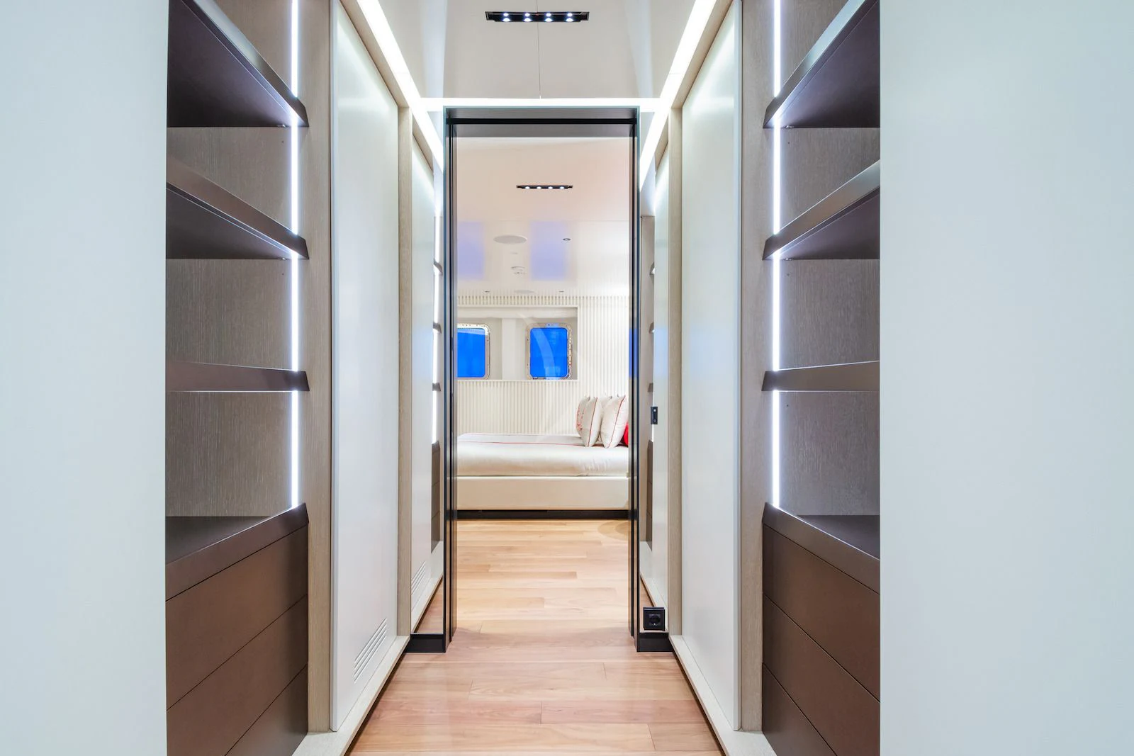 a room with a closet and a bed aboard RIO Yacht for Sale
