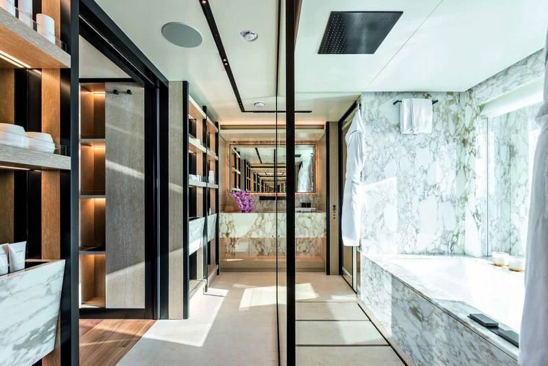 a room with a glass door aboard RIO Yacht for Sale