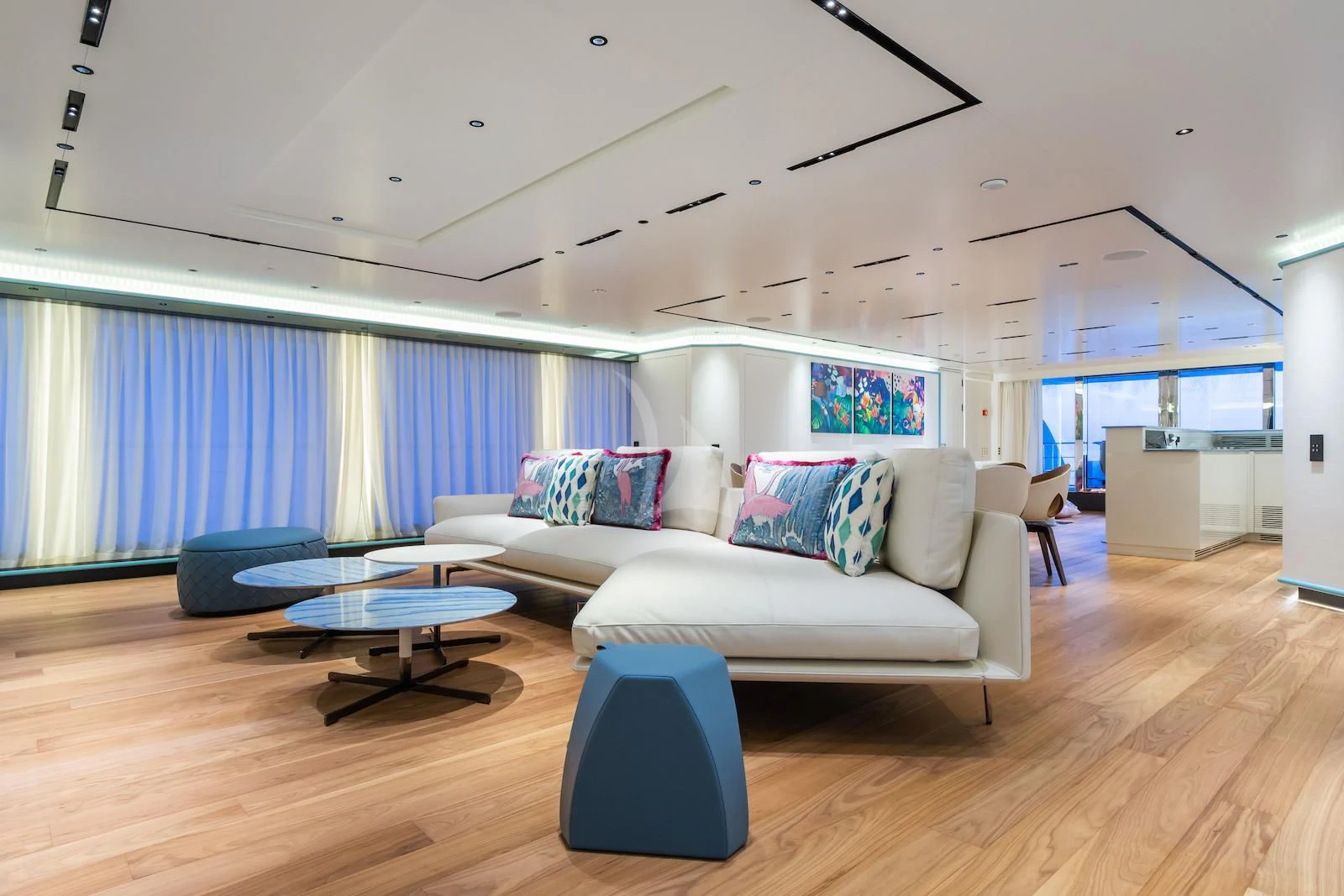 a living room with a couch and a table aboard RIO Yacht for Sale