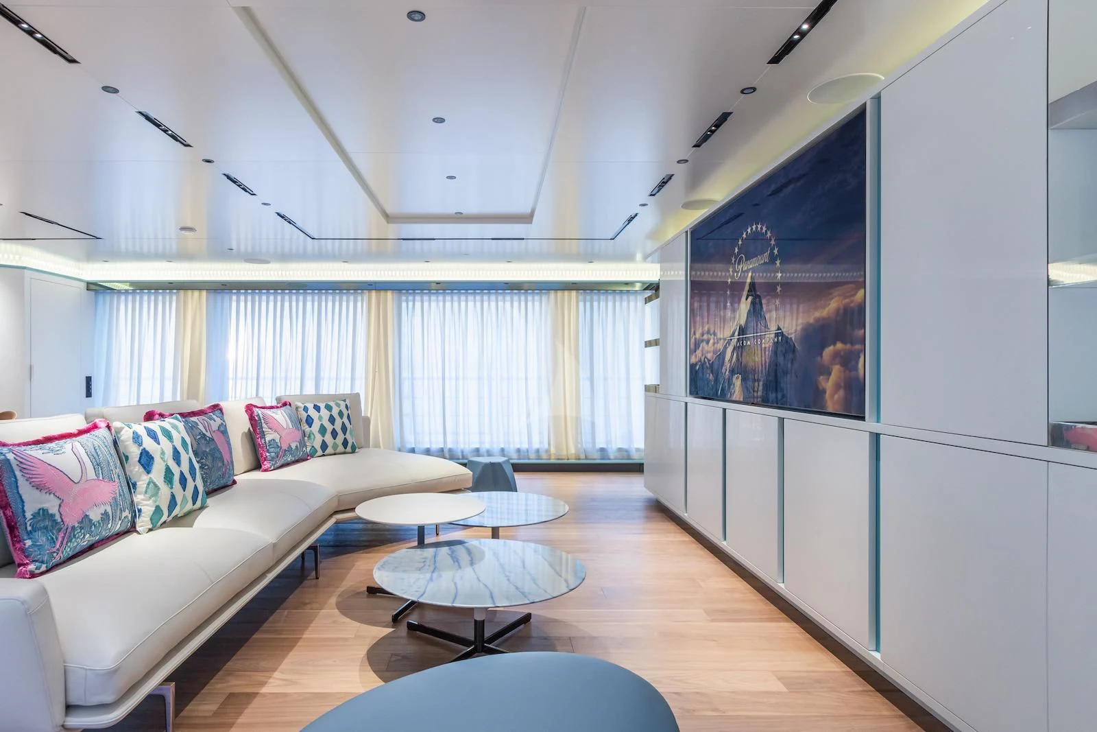 a living room with a large window aboard RIO Yacht for Sale