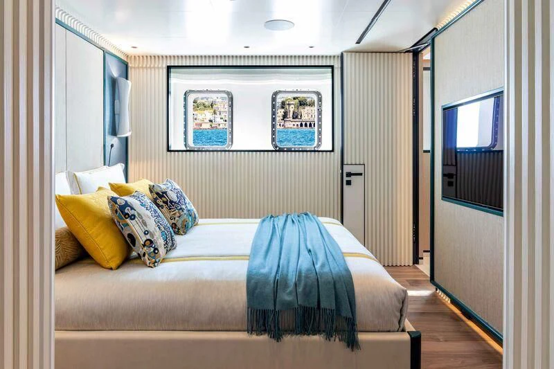 a bed in a room aboard RIO Yacht for Sale
