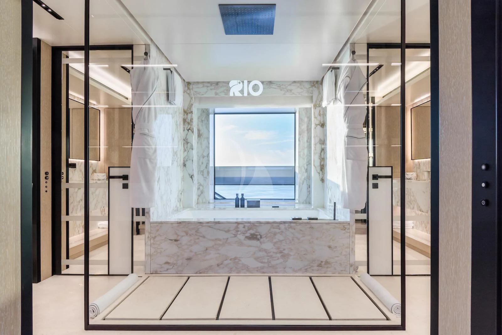 a room with a window and a shower aboard RIO Yacht for Sale