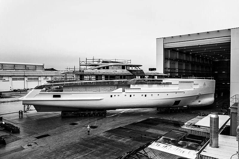 a large airplane is parked in a hangar aboard RIO Yacht for Sale