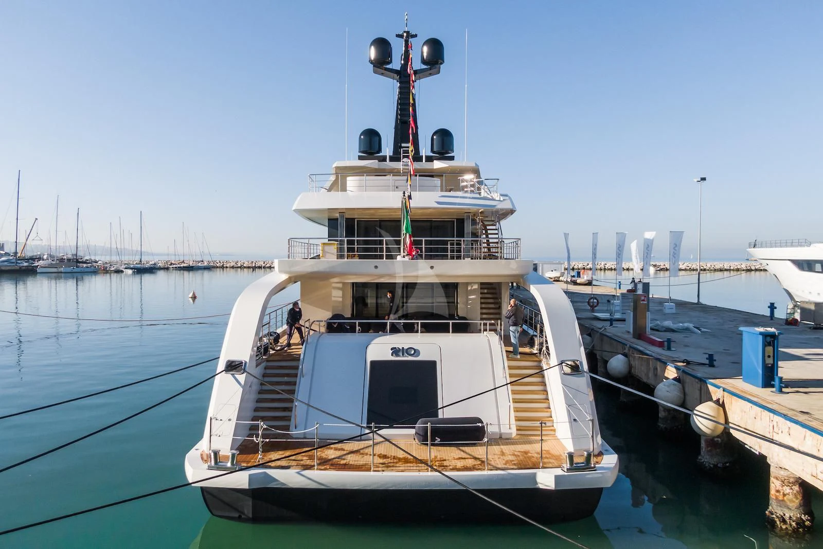 a boat docked at a pier aboard RIO Yacht for Sale