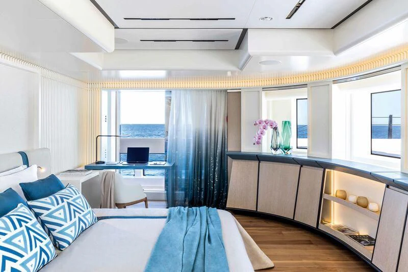 a room with a table and chairs aboard RIO Yacht for Sale