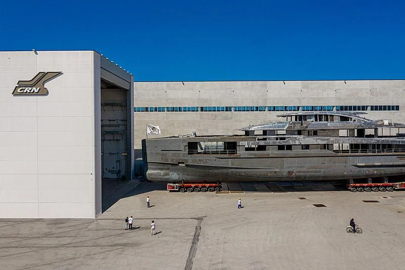 a large building with people walking around aboard RIO Yacht for Sale