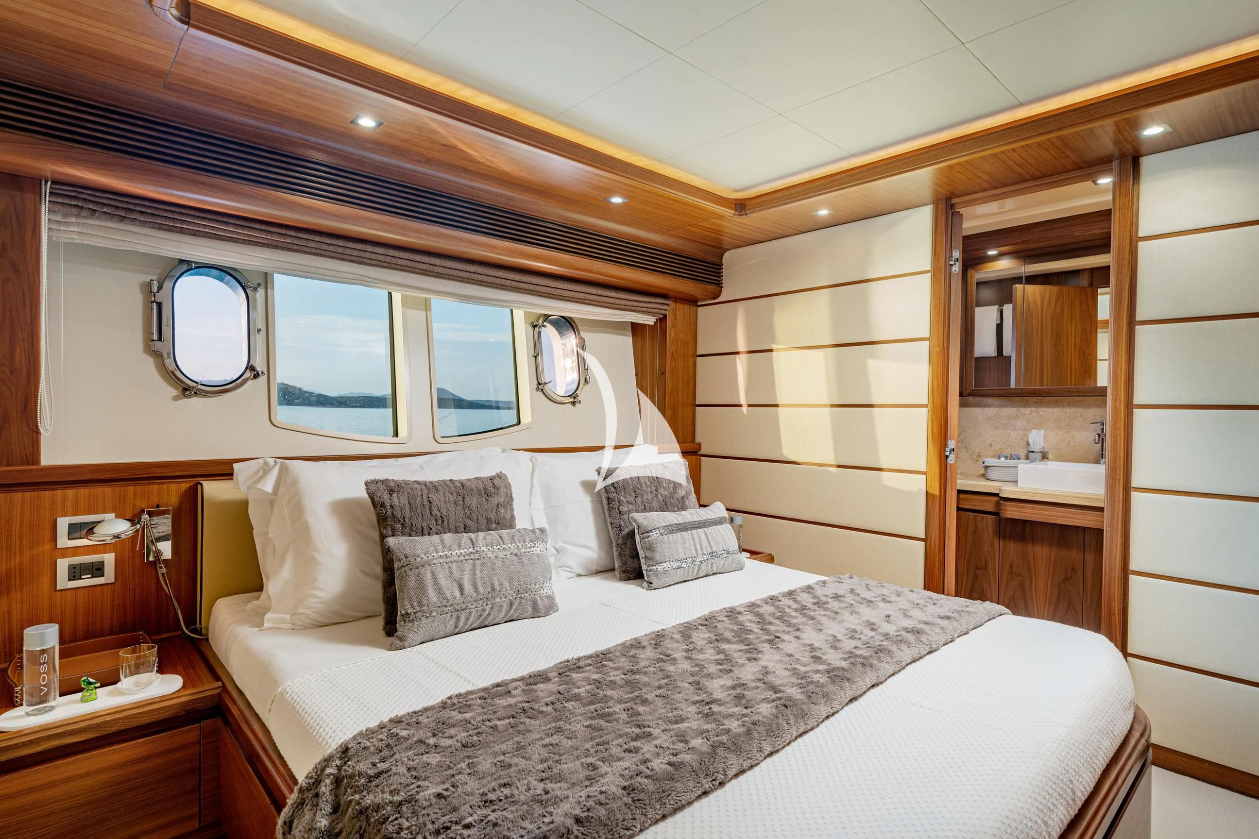 a bed in a room aboard ETHNA Yacht for Sale