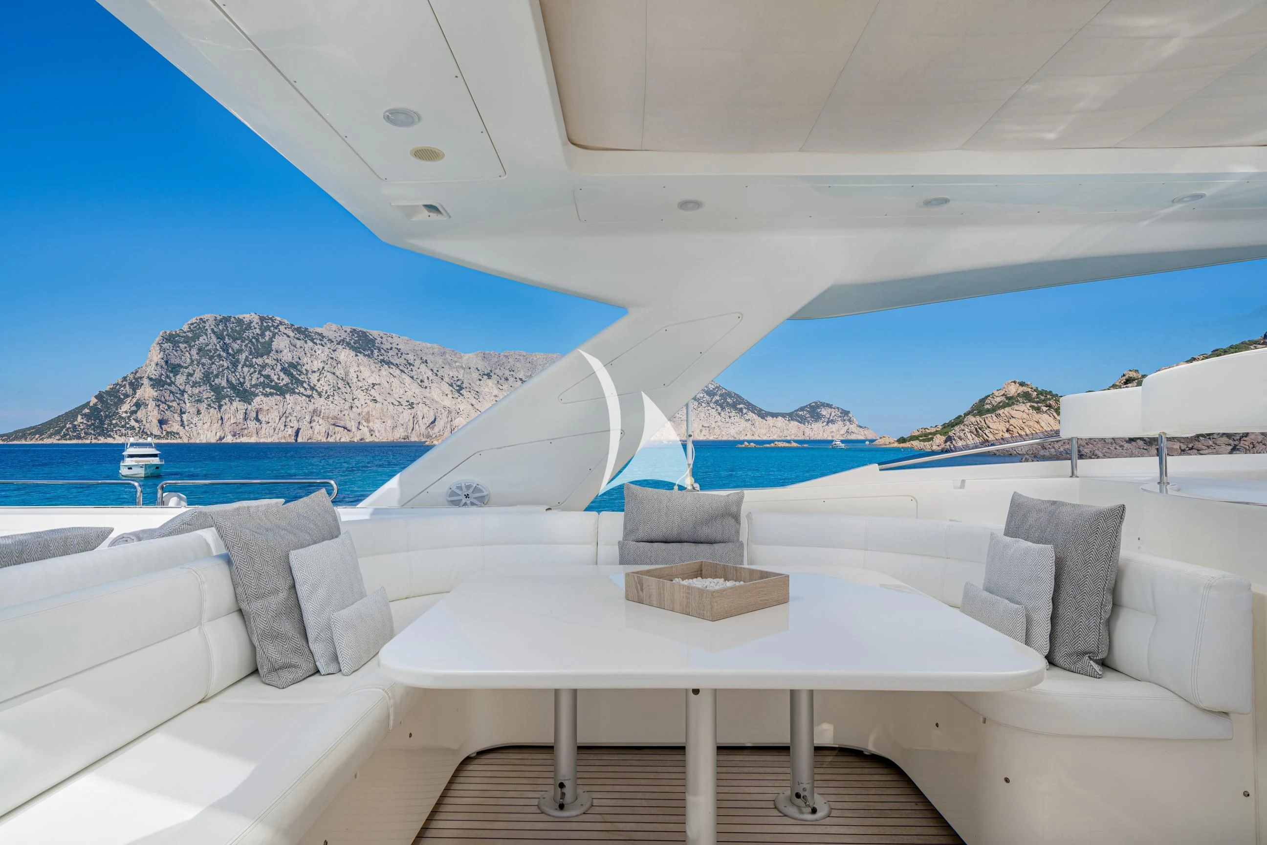 a room with a table and chairs aboard ETHNA Yacht for Sale