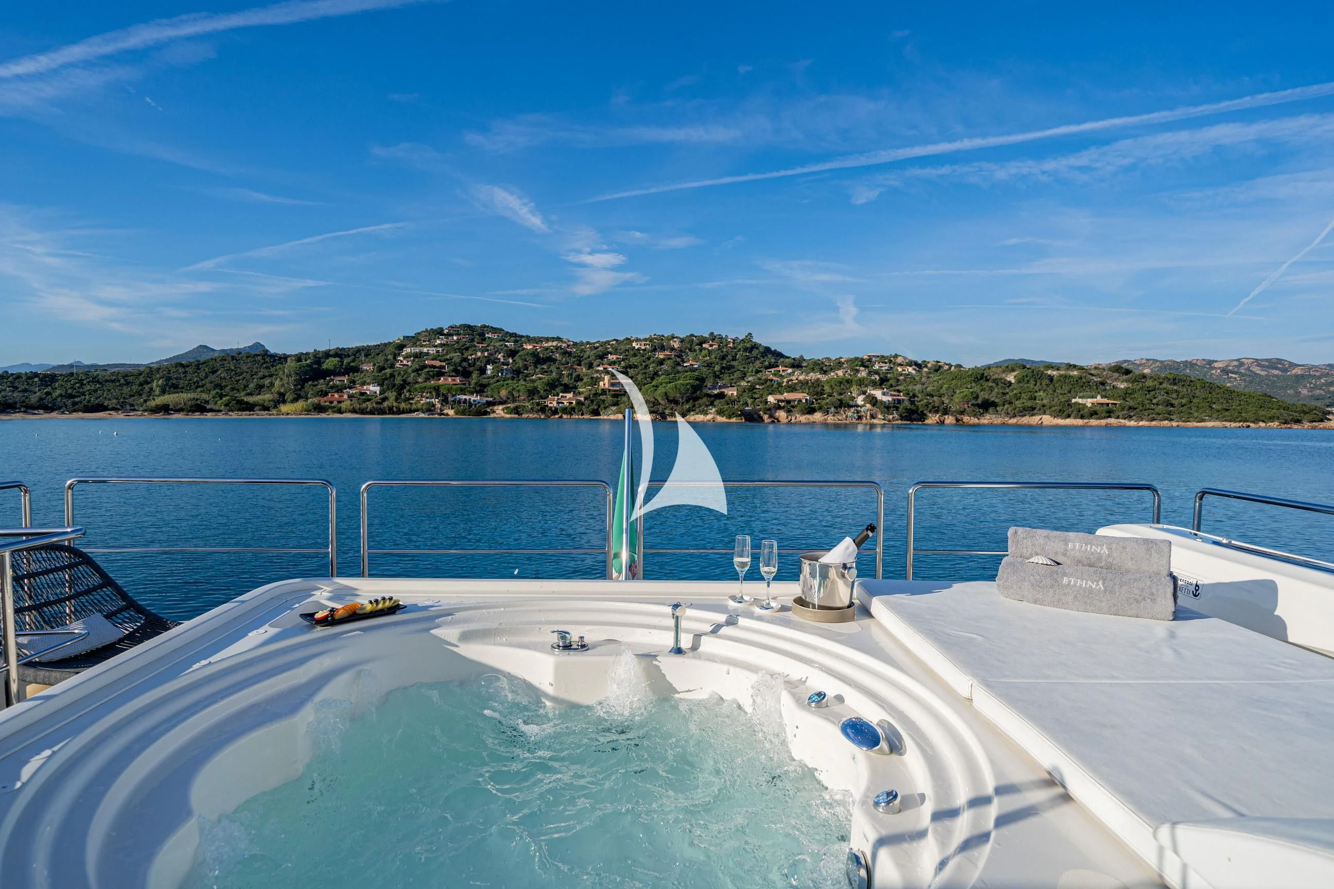 a large pool with a water slide aboard ETHNA Yacht for Sale