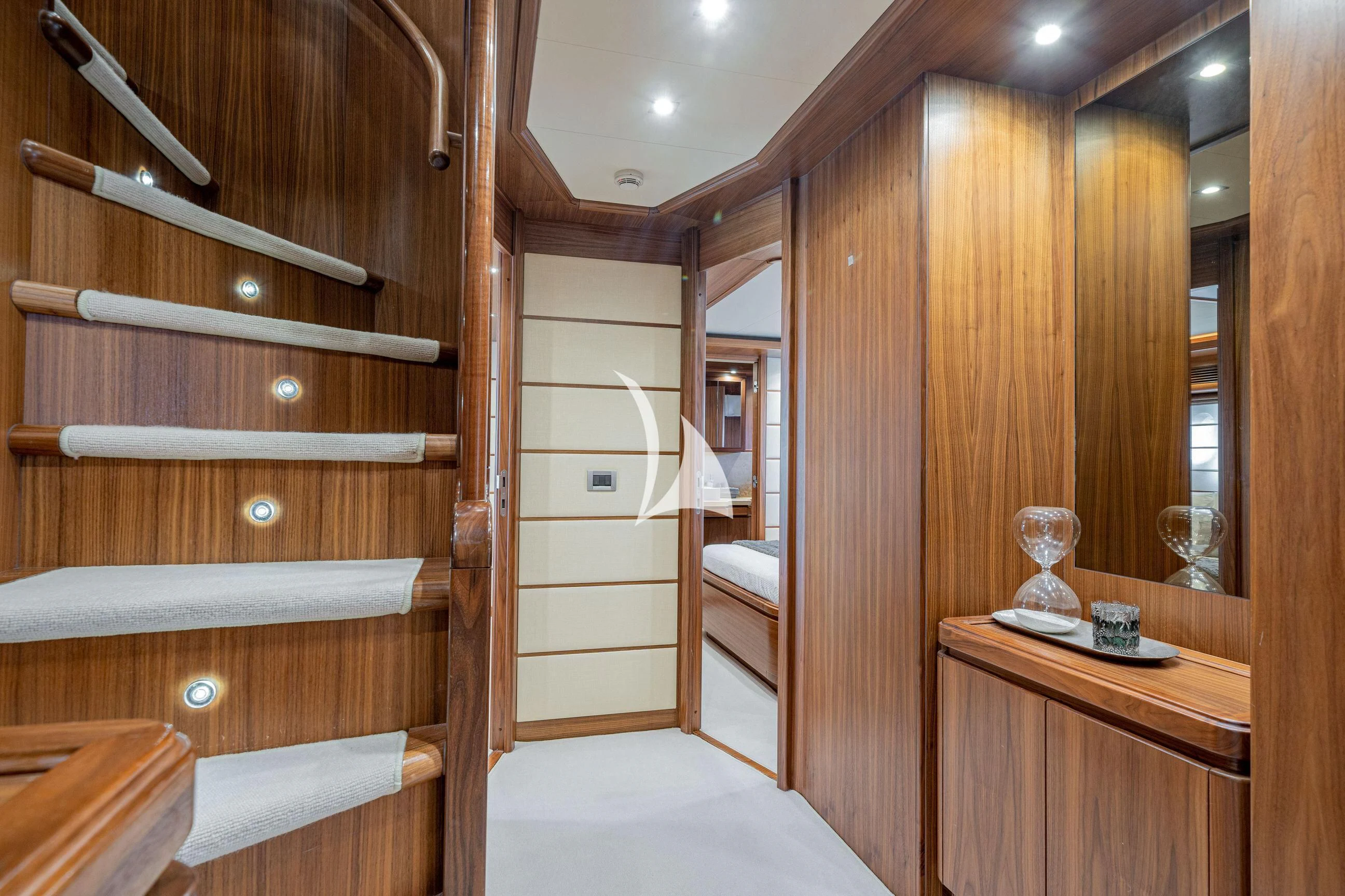 a room with a wood door and a mirror aboard ETHNA Yacht for Sale