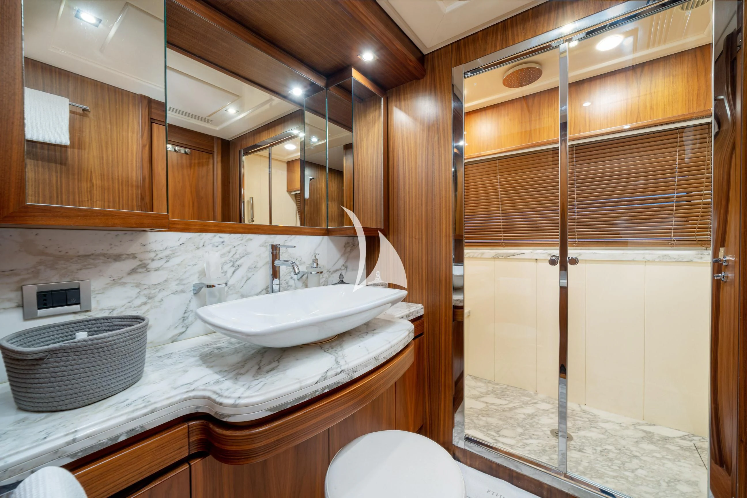 a bathroom with a sink and a shower aboard ETHNA Yacht for Sale