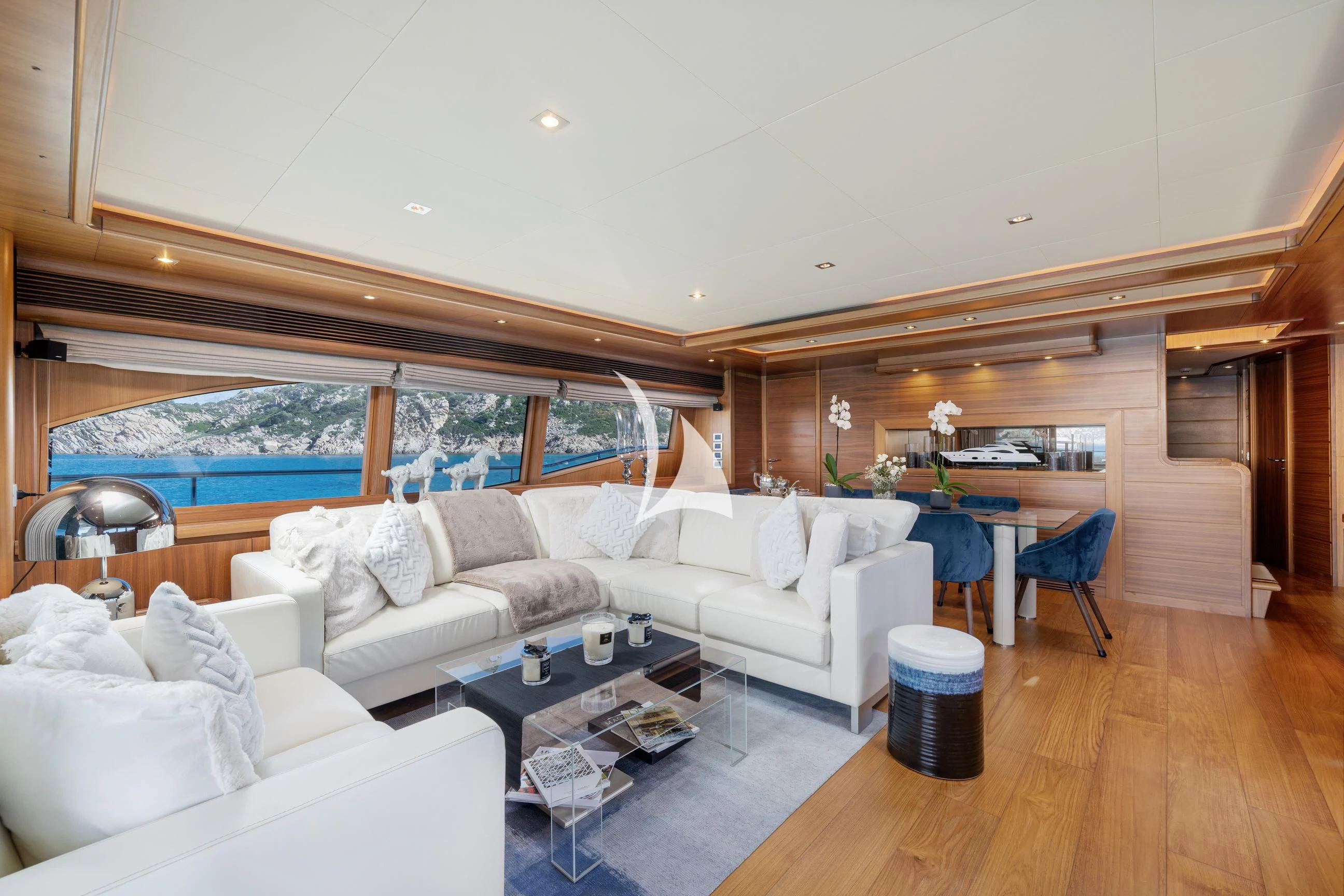 a living room with a large window aboard ETHNA Yacht for Sale