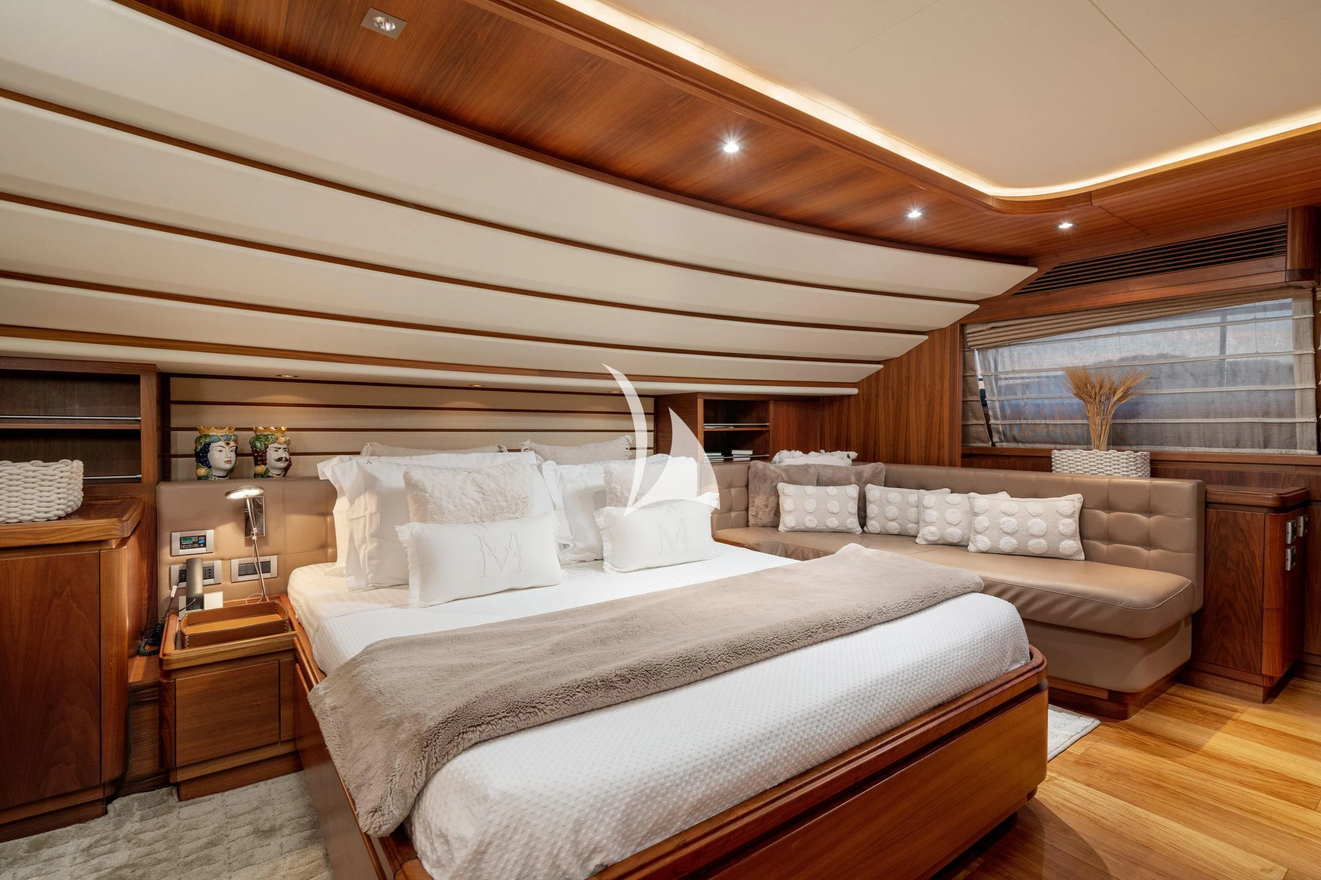a bed in a room aboard ETHNA Yacht for Sale