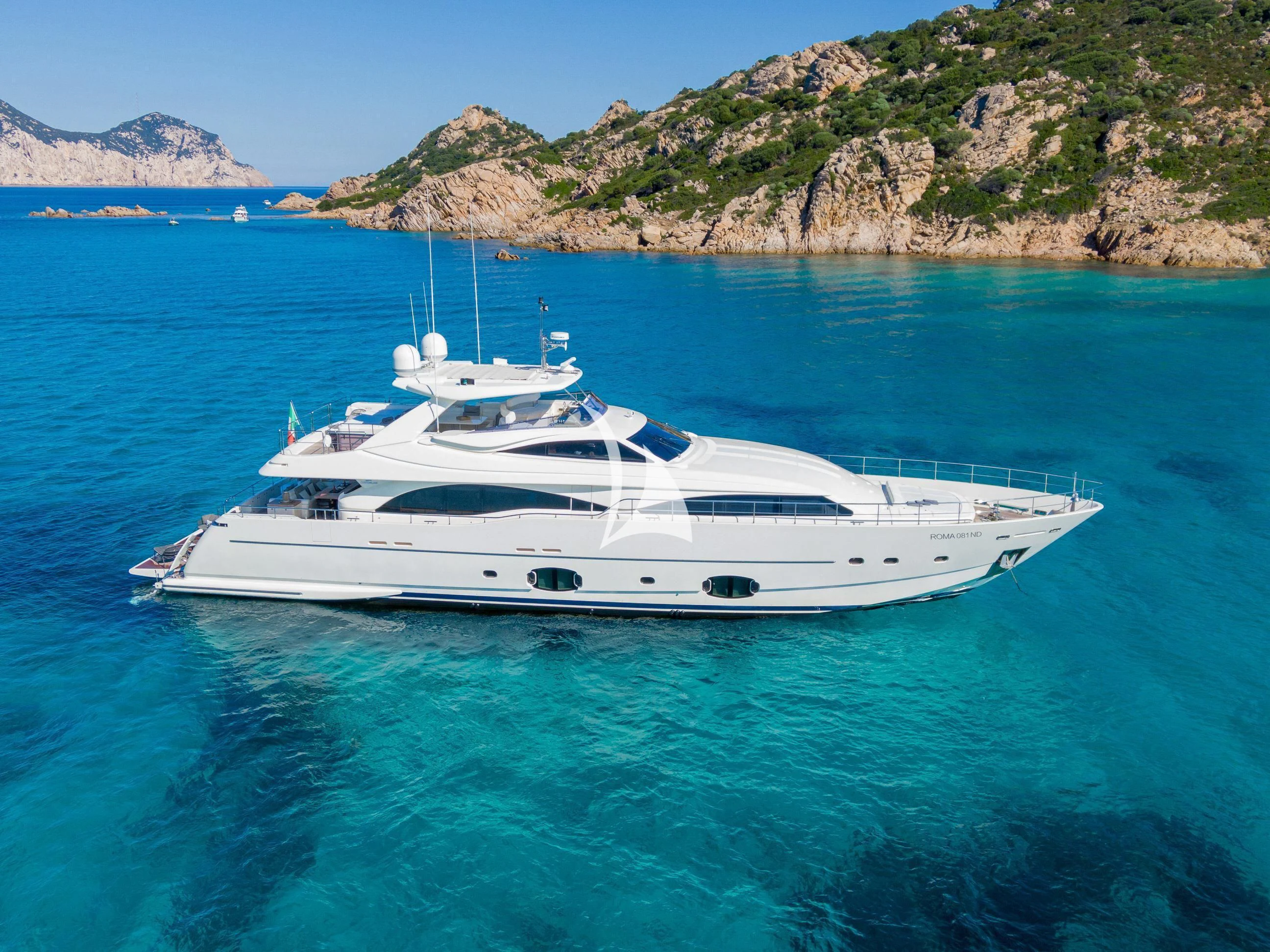 a white yacht in the water aboard ETHNA Yacht for Sale