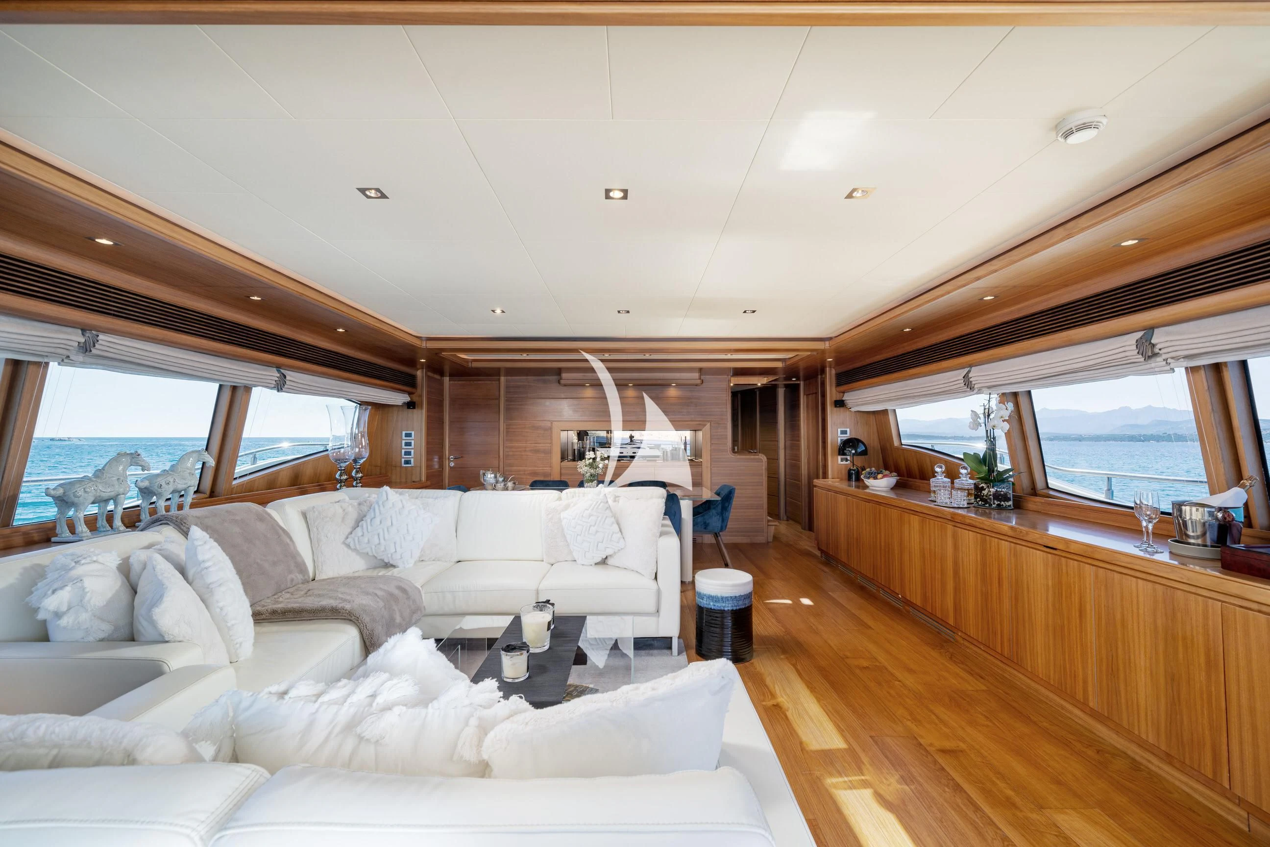 a living room with a large window aboard ETHNA Yacht for Sale