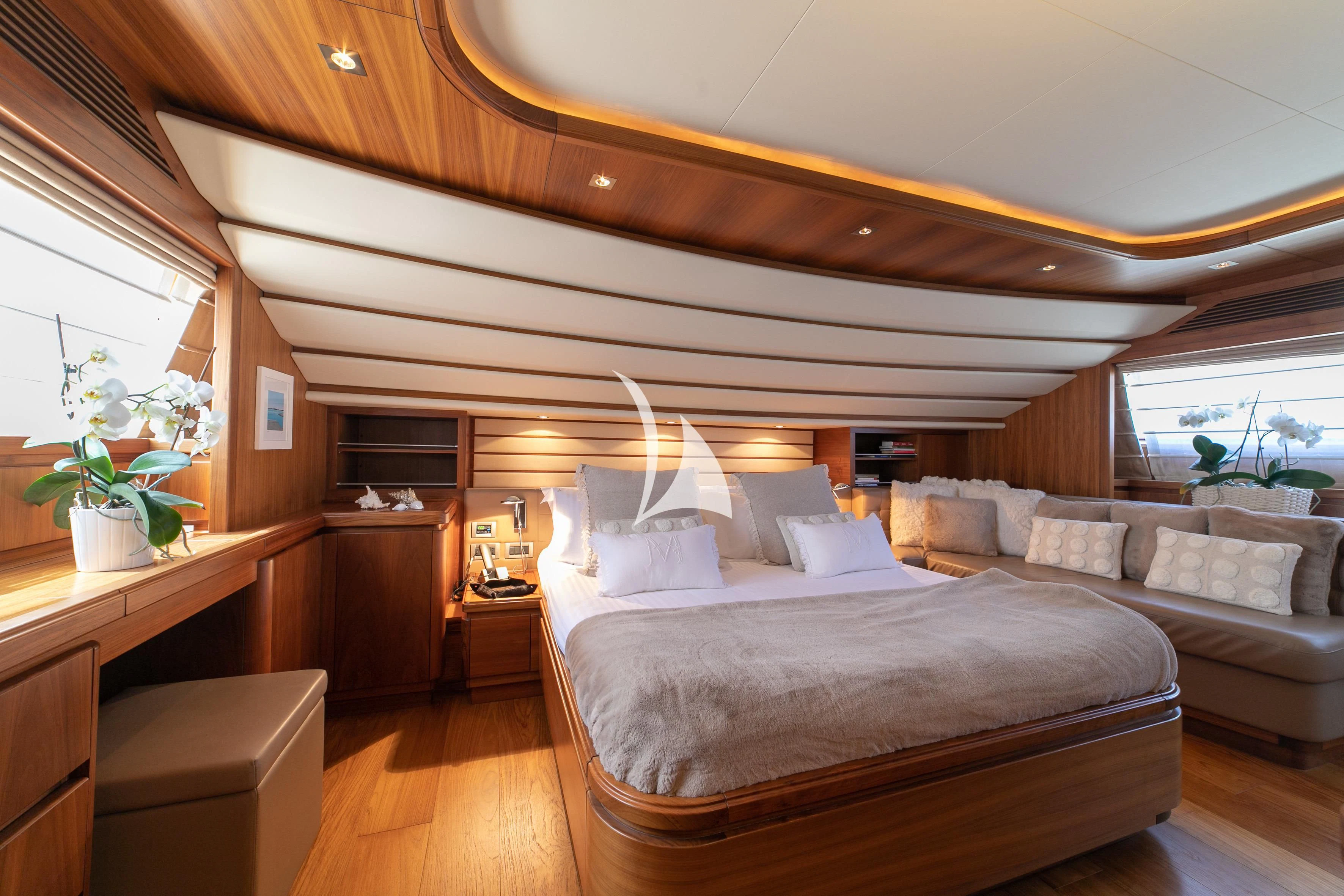 a bed in a room aboard ETHNA Yacht for Sale