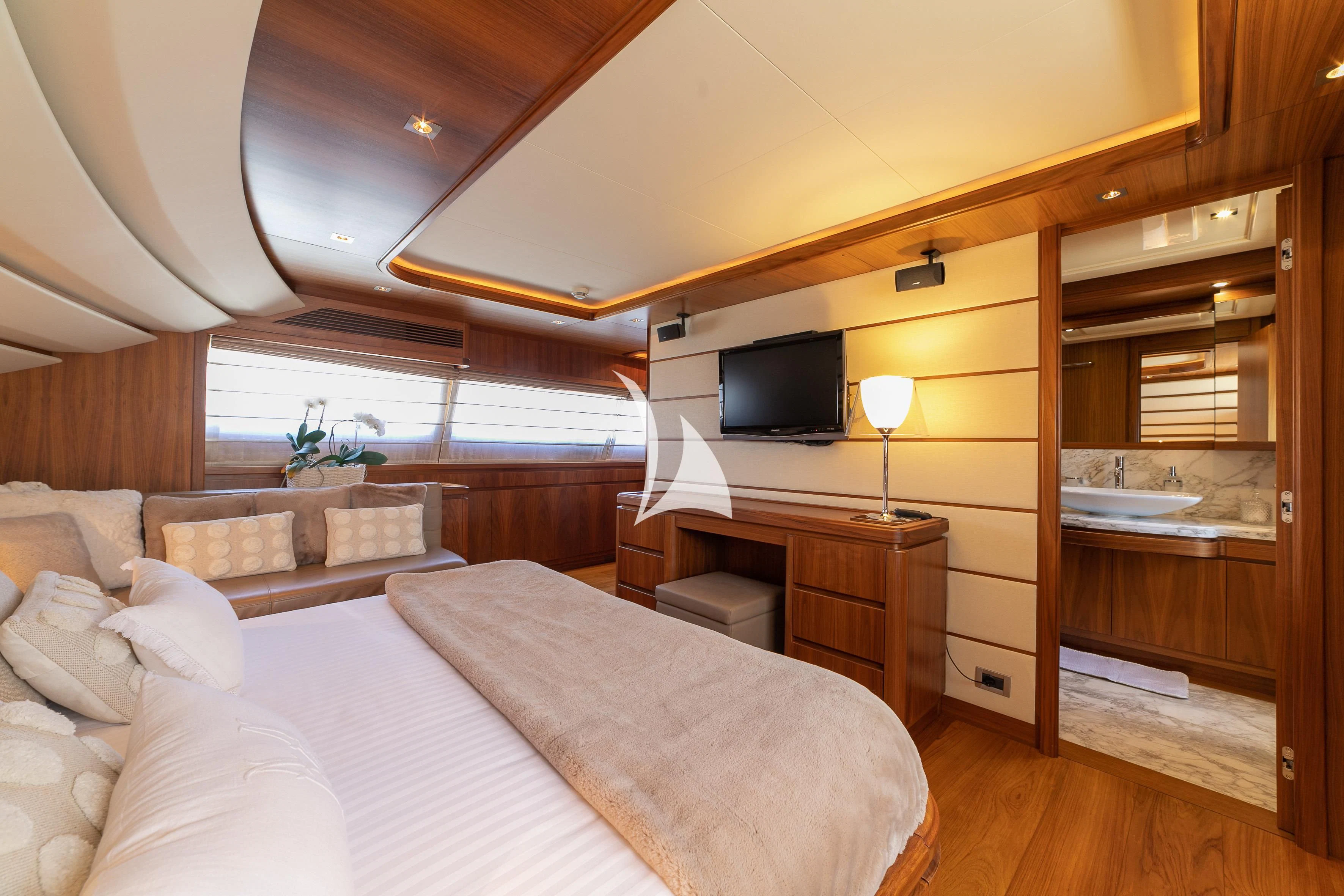 a room with a bed and a tv aboard ETHNA Yacht for Sale