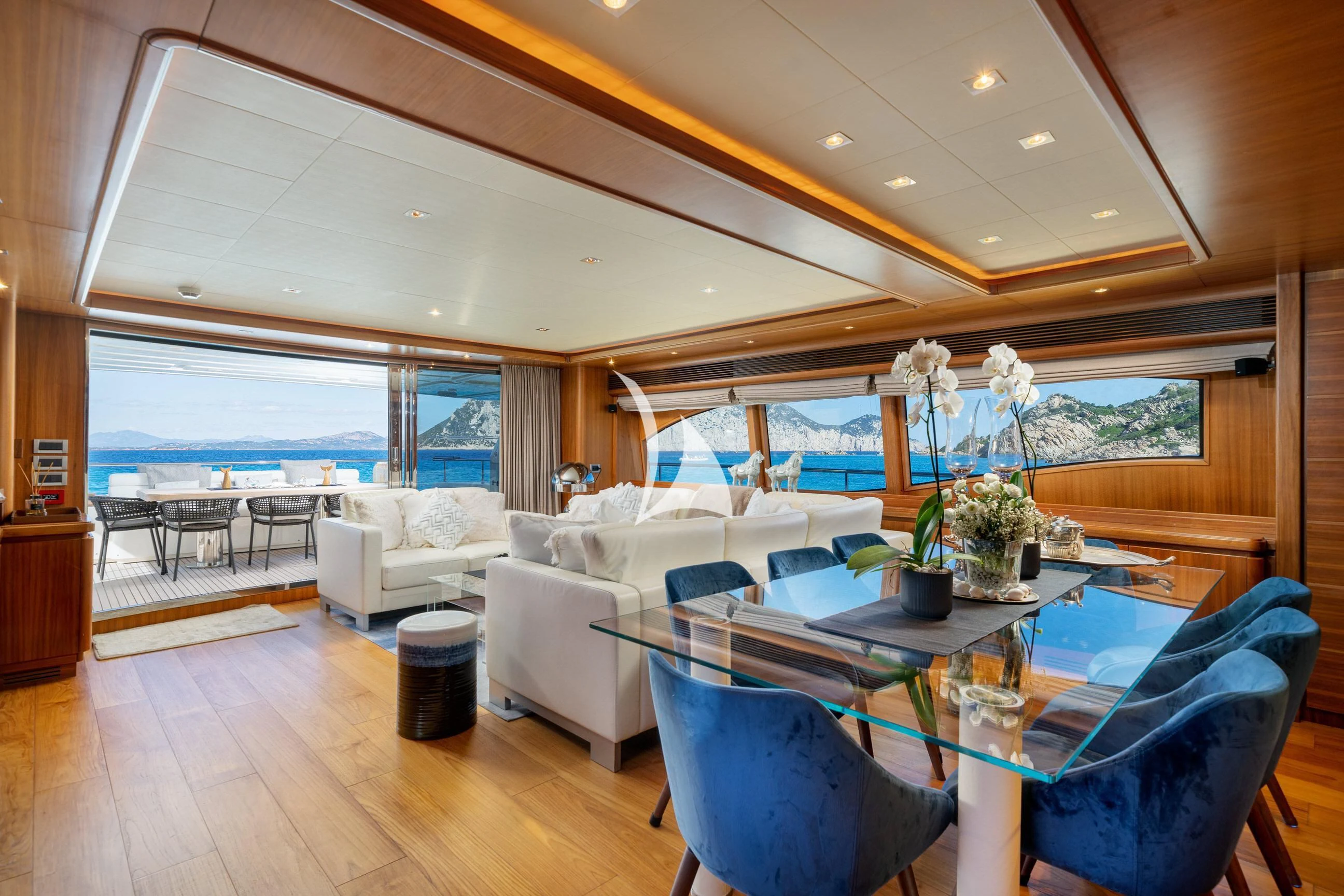 a living room with a large window aboard ETHNA Yacht for Sale