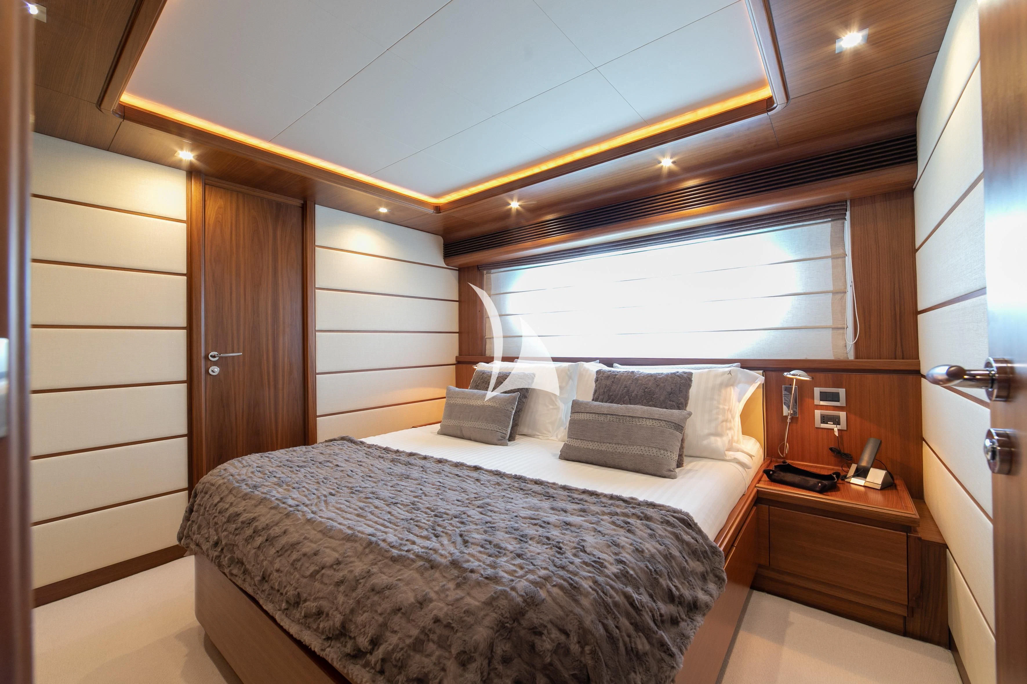 a bed in a room aboard ETHNA Yacht for Sale