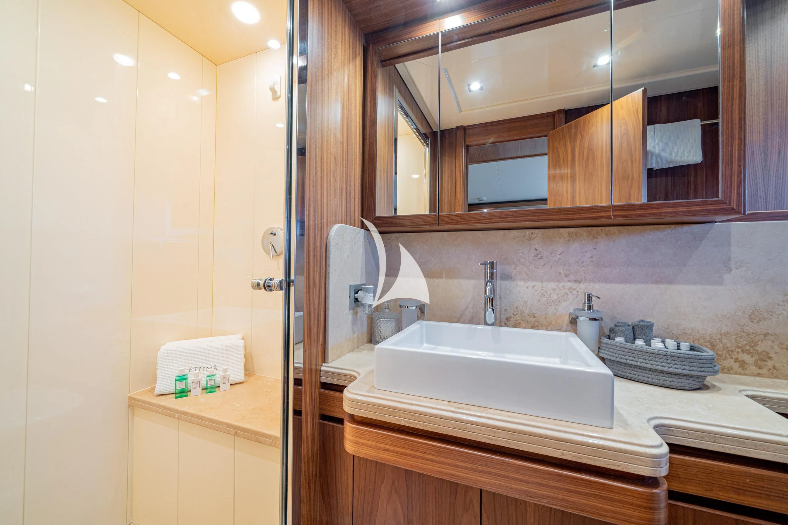 a bathroom with a sink and a mirror aboard ETHNA Yacht for Sale