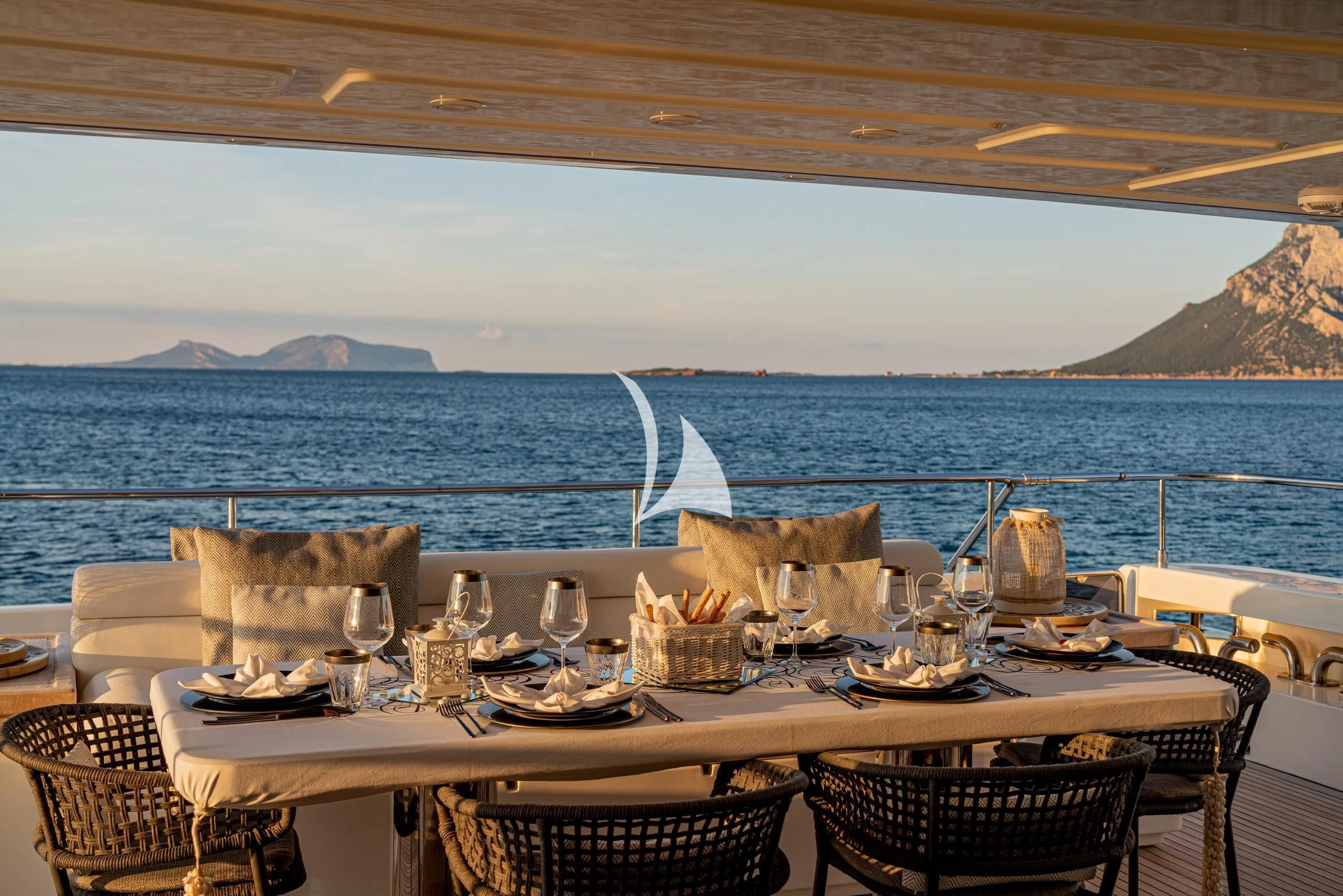 a table set for a dinner aboard ETHNA Yacht for Sale