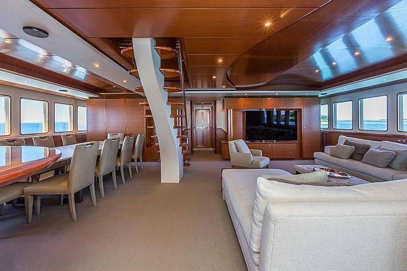 a living room with a staircase aboard ZIG ZAG Yacht for Sale