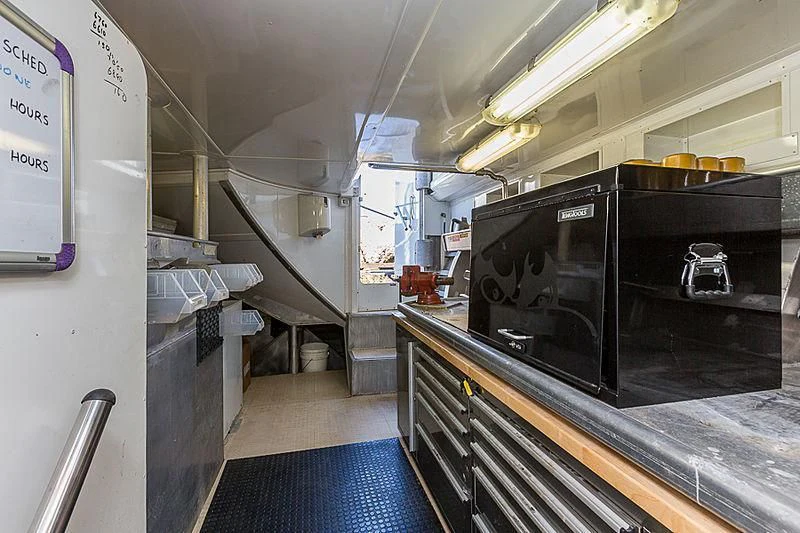 a large industrial kitchen aboard ZIG ZAG Yacht for Sale