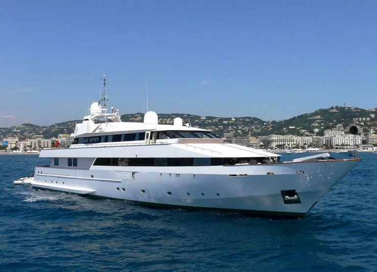 a white yacht in the water aboard ALL SEVEN Yacht for Sale