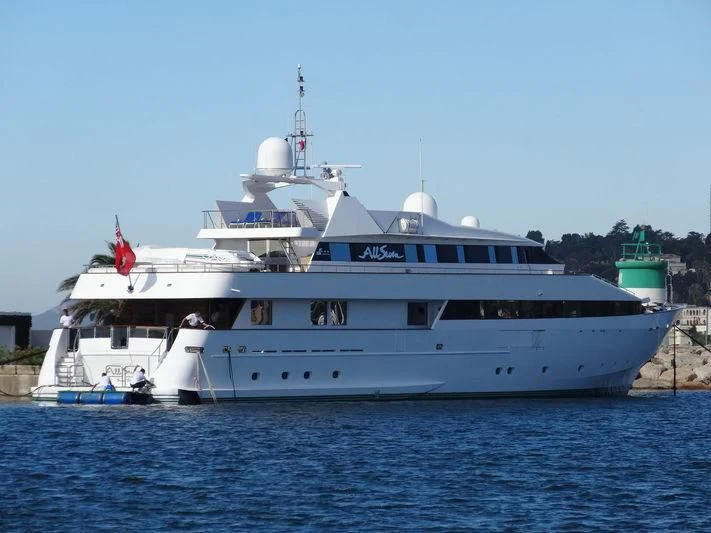 a large white boat in the water aboard ALL SEVEN Yacht for Sale