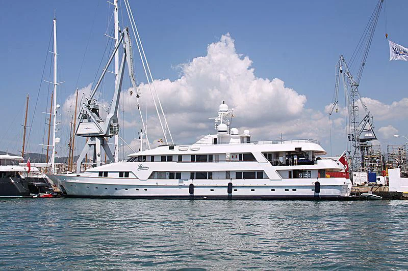 a large white boat in the water aboard VIXIT Yacht for Sale