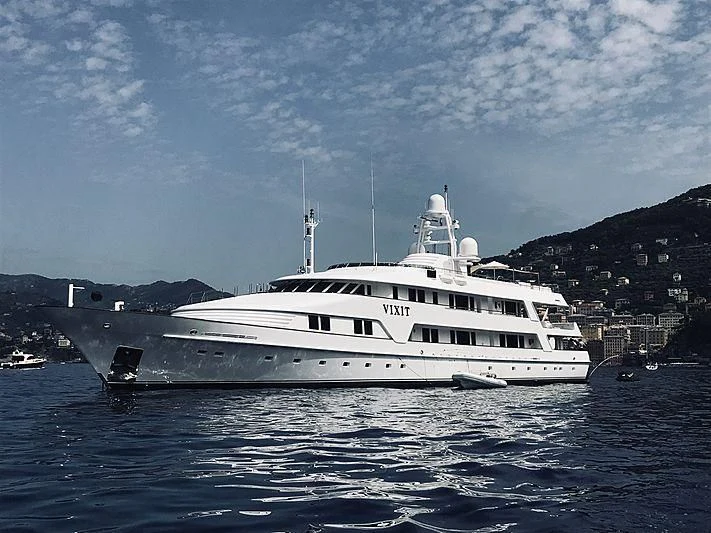 a white boat in the water aboard VIXIT Yacht for Sale