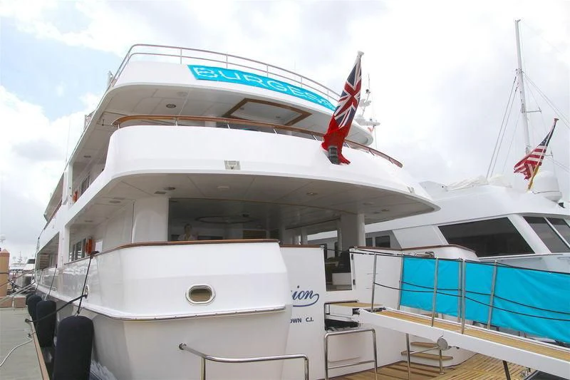 a boat with a flag on the front aboard VIXIT Yacht for Sale