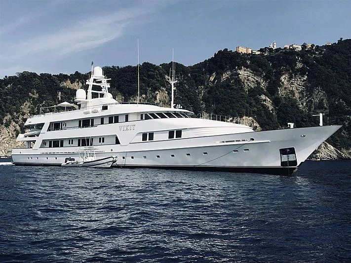 a white yacht in the water aboard VIXIT Yacht for Sale