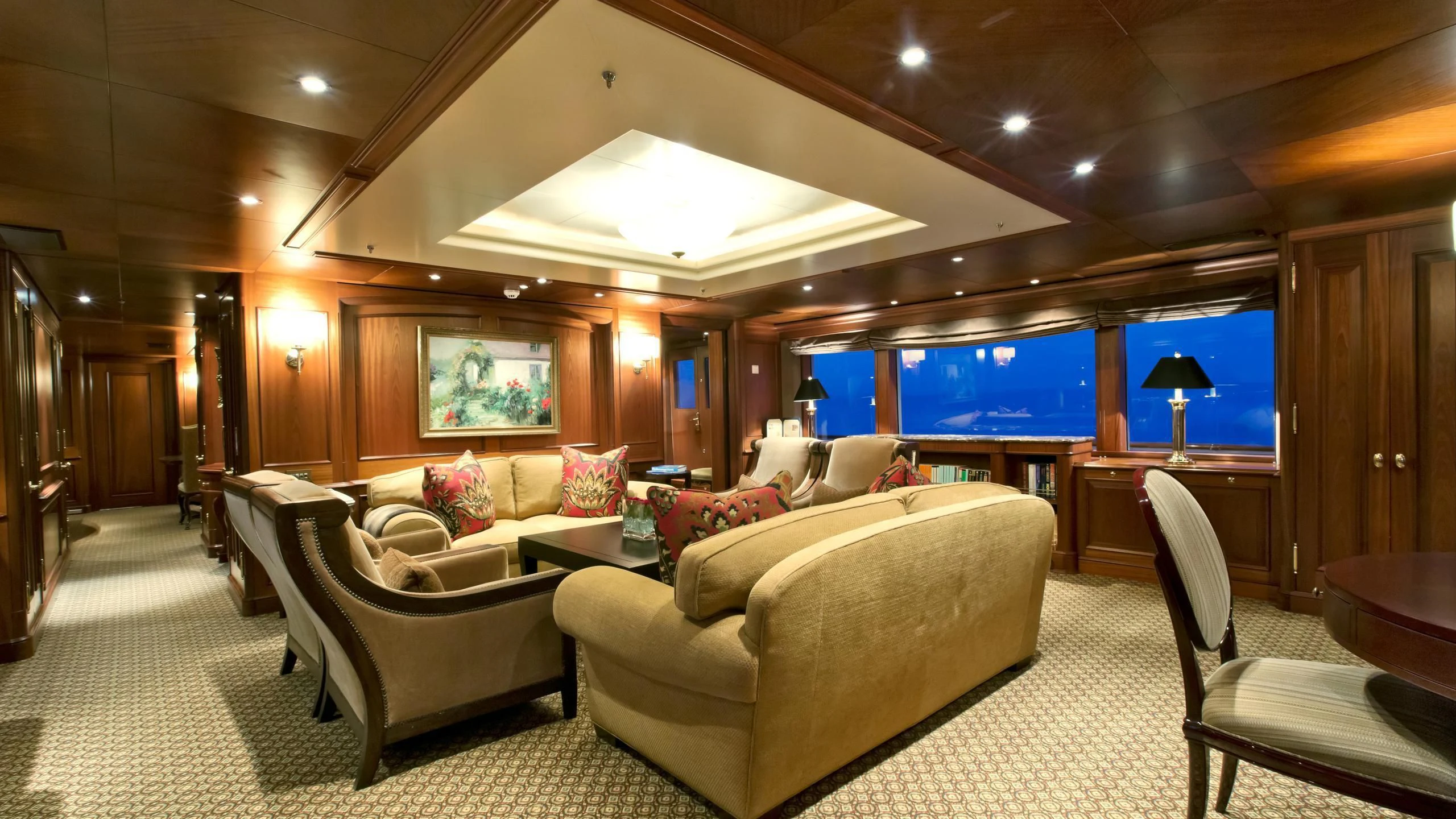 a large living room with a large screen aboard VIXIT Yacht for Sale